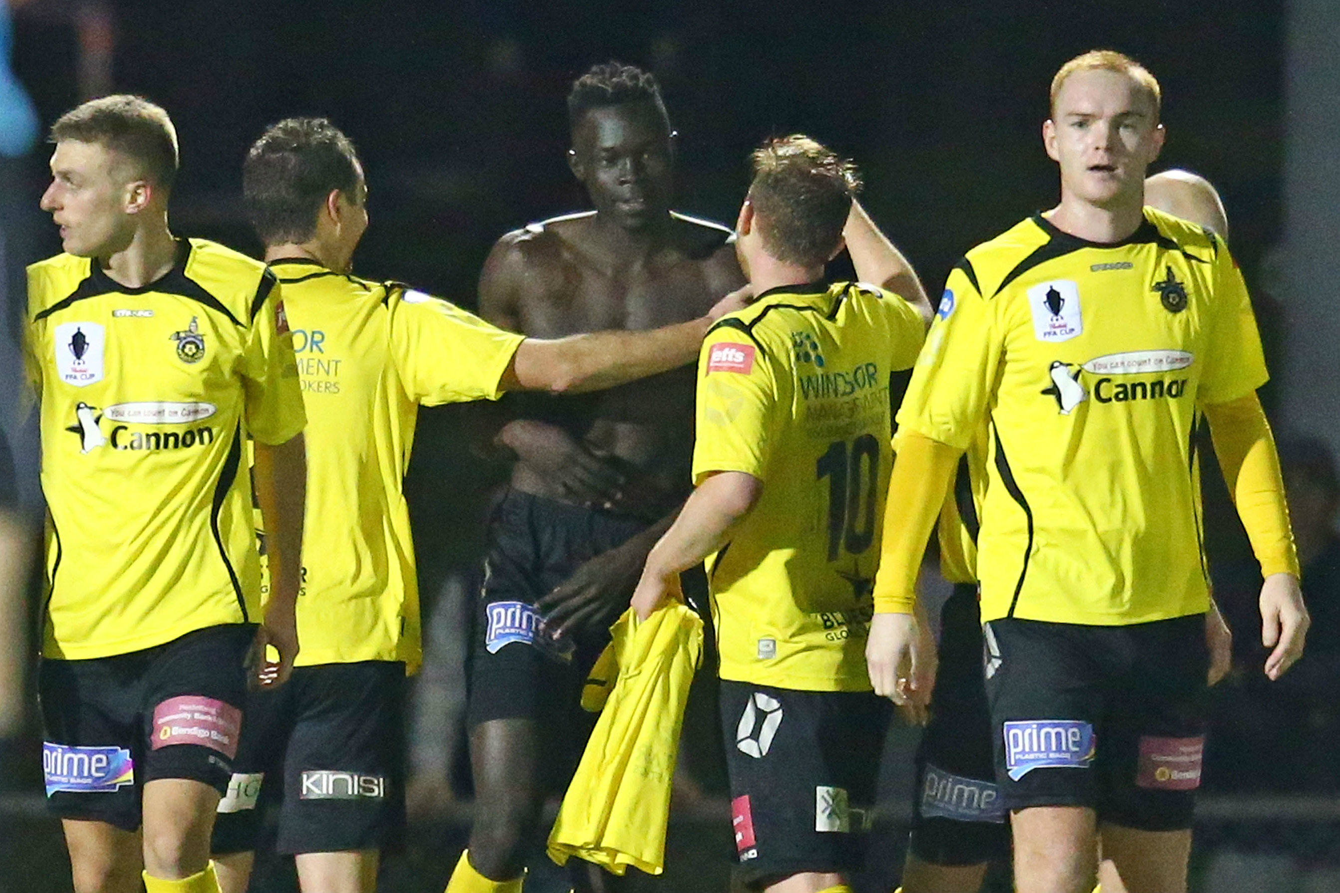 Heidelberg celebrate Kenny Athiu's match-sealing goal against Sydney United.