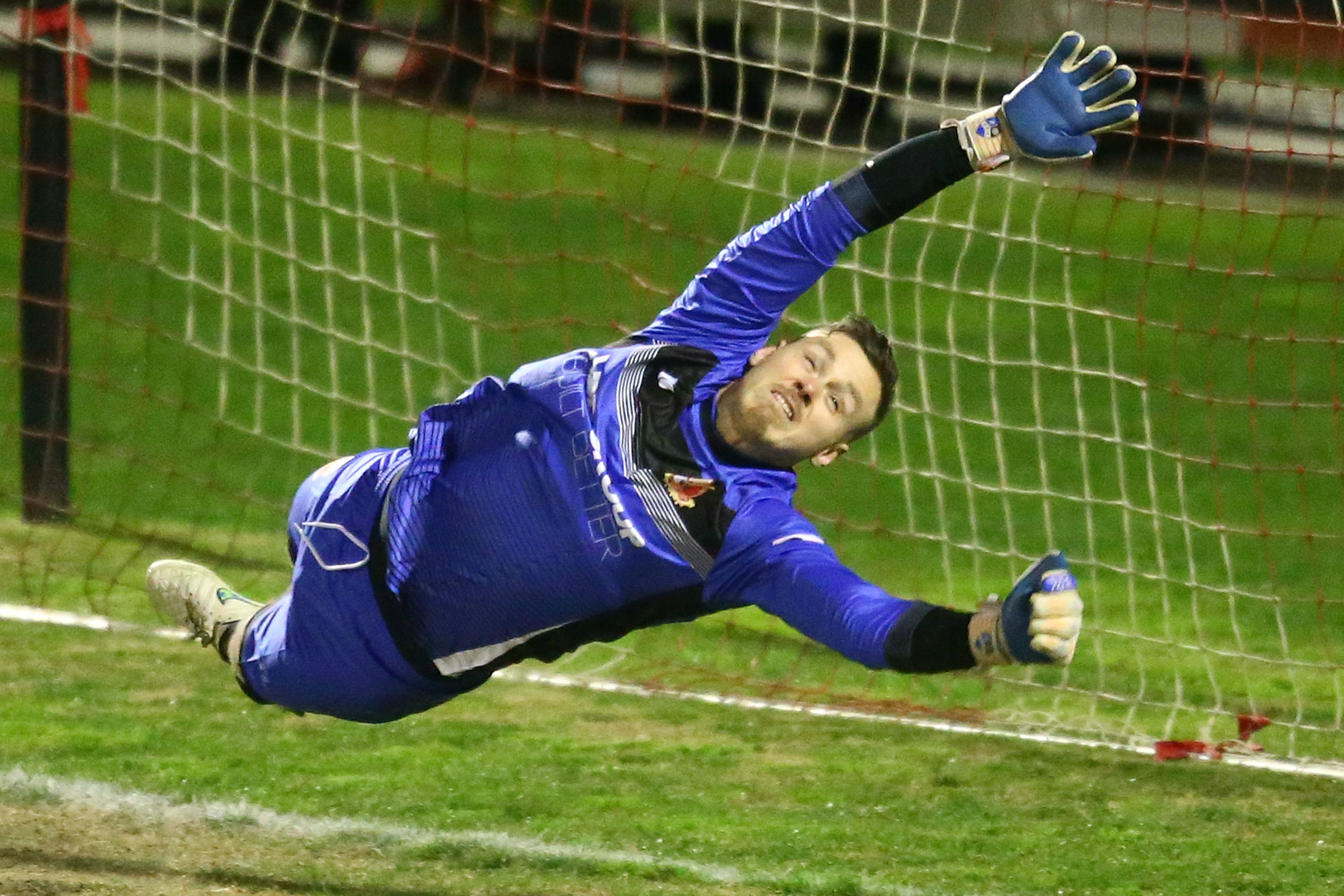 Chris Oldfield makes a save for Hume City in the FFA Cup.