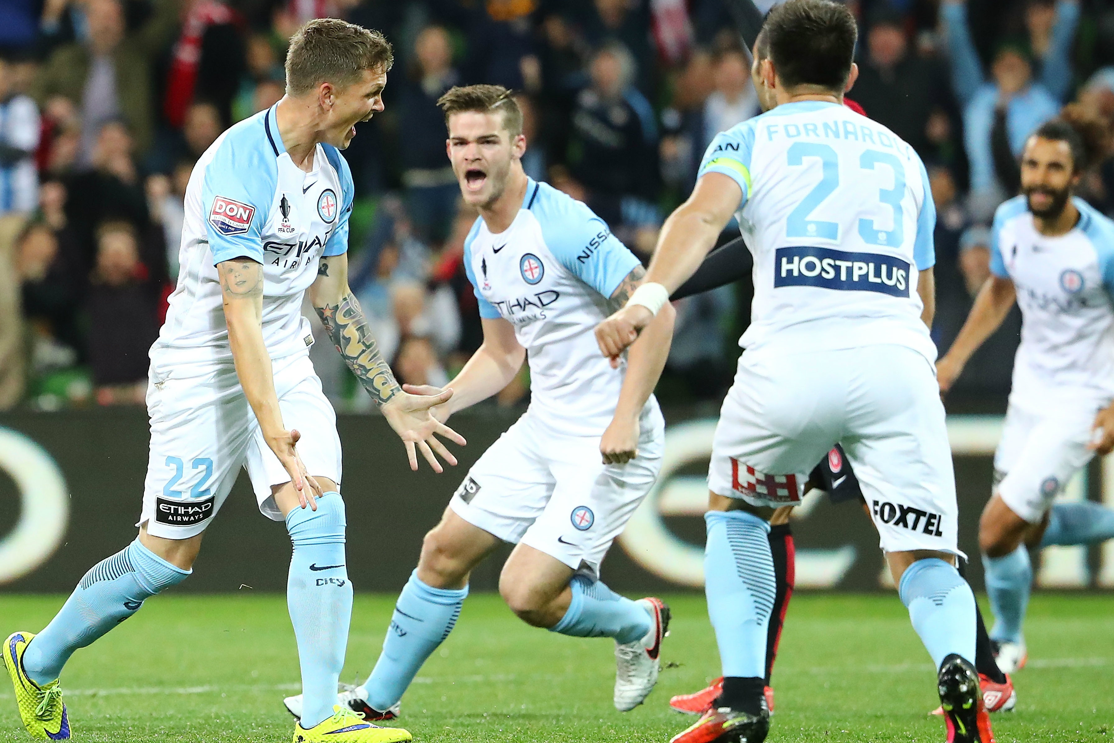 City players celebrate Michael Jakobsen's stunning goal.
