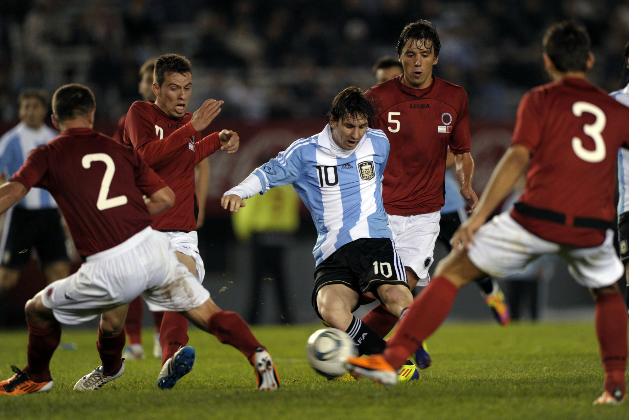 Lionel Messi's shot beats Kristi Vangjeli's outstretched leg as Argentina beat Albania 4-0.