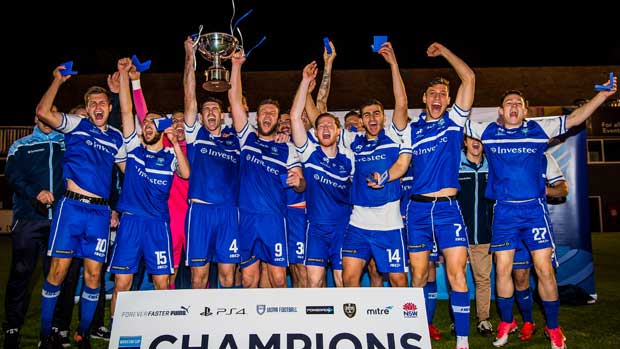 Hakoah players celebrate their Waratah Cup triumph against APIA Leichhardt on Sunday. Pic courtesy of Football NSW.