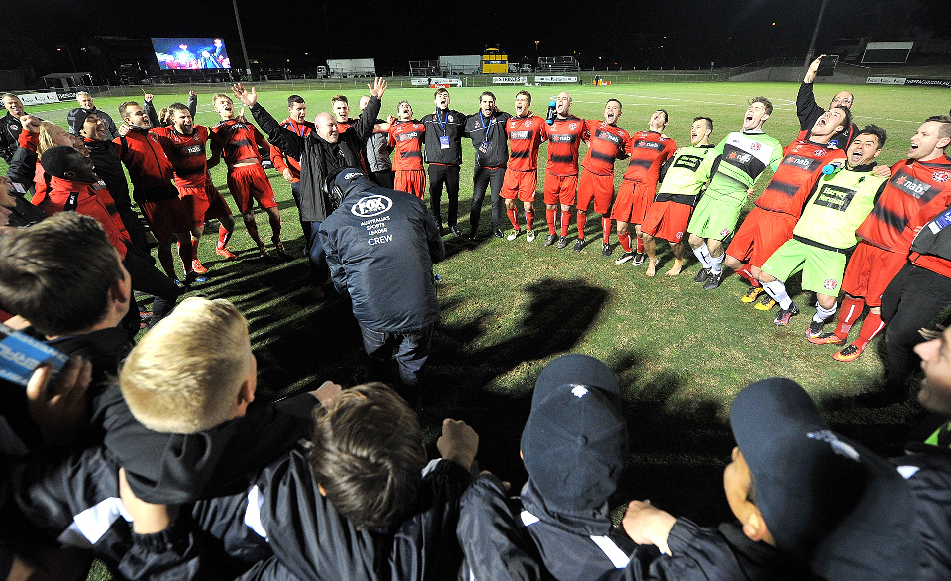 Redlands United celebrate their victory after the Australia Cup round of 32 match between Redlands United and Adelaide United at Perry Park on August 3, 2016