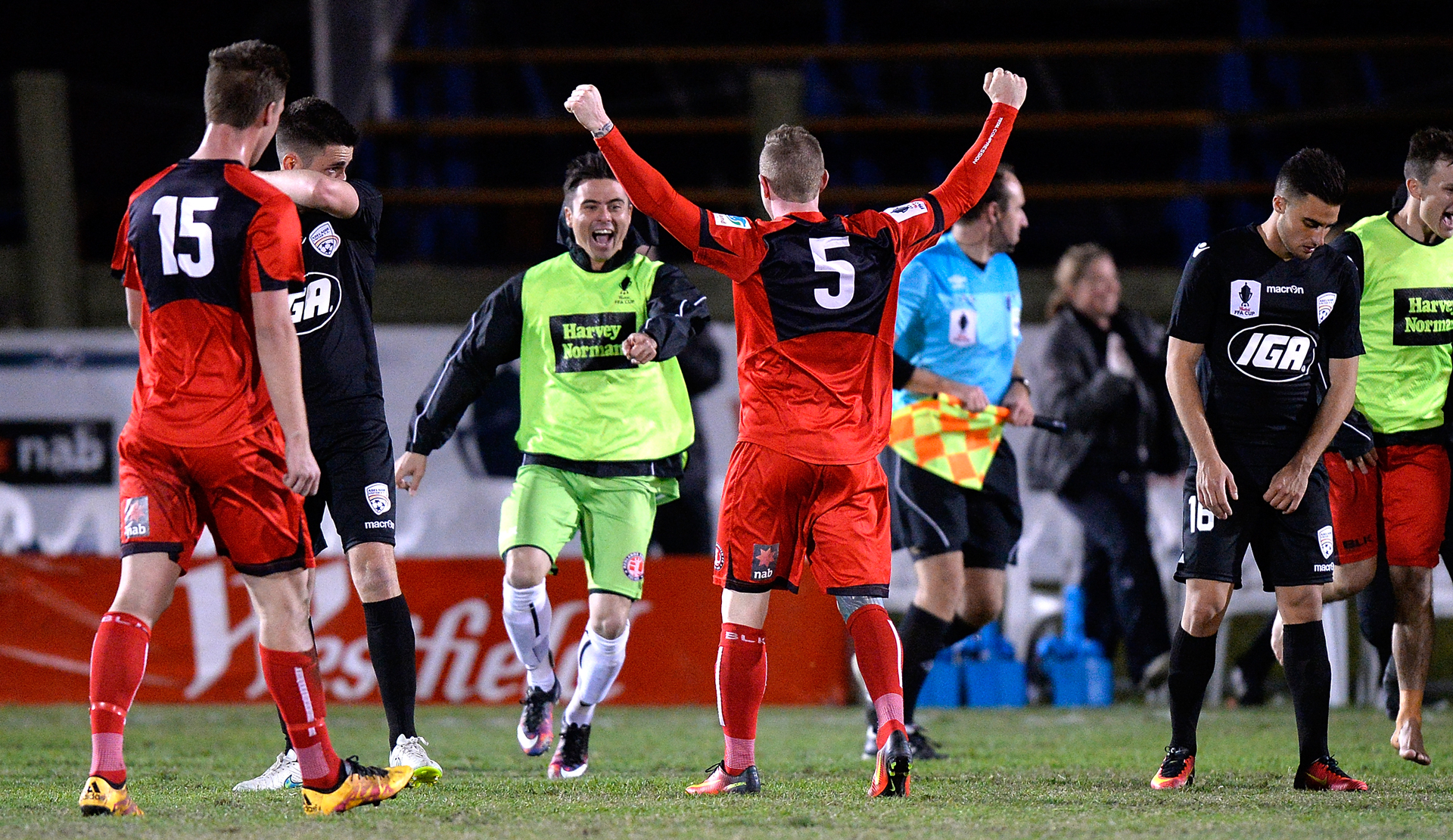 Paul O'Brien of Redlands United celebrates victory with his team mates 
