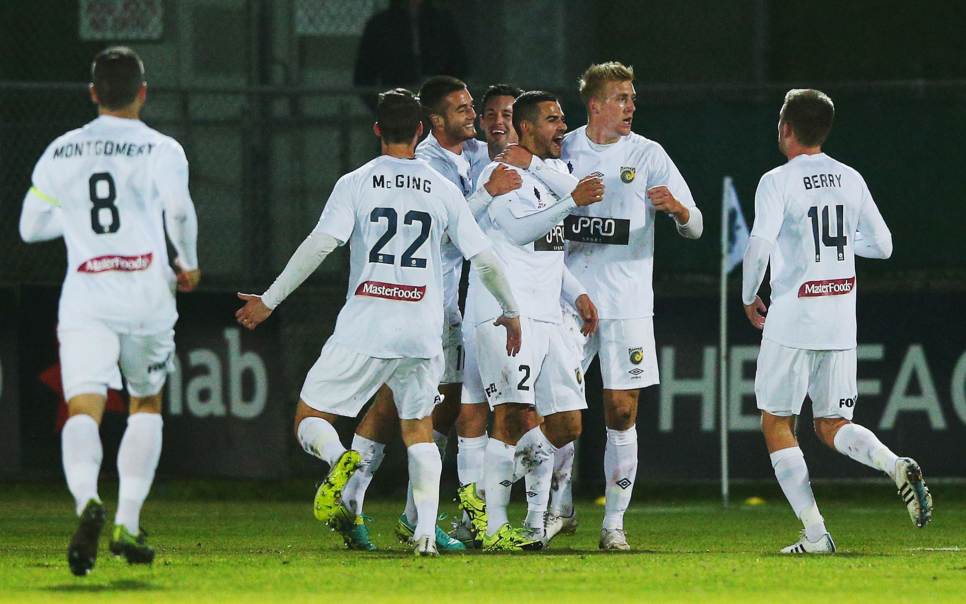 Mariners players celebrates a goal by Blake Powell of the Mariners during the Australia Cup Round of 32 match between Green Gully and the Central Coast Mariners at Green Gully Reserve on August 2, 2016
