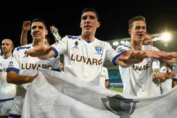 South Melbourne players after their Westfield FFA Cup win over Gold Coast City.