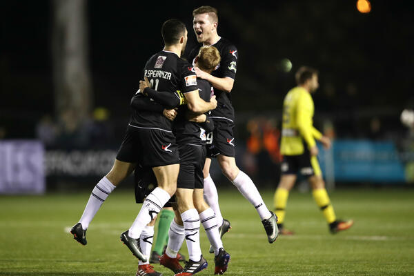 Blacktown celebrate a goal against Mariners.