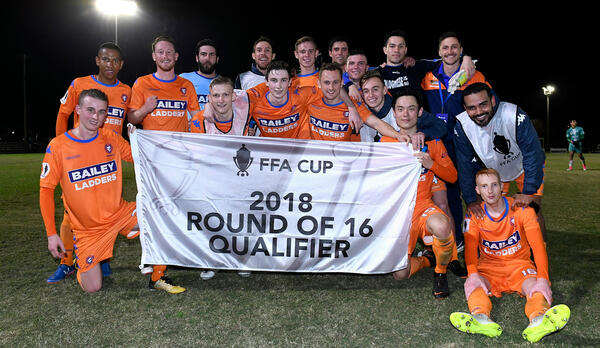 Lions FC celebrate their Round of 32 win against Olympic