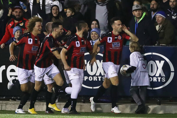 Rockdale City celebrate Gaitatzis' early goal.