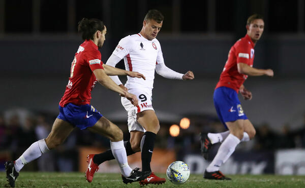 Oriol Riera runs at Bonnyrigg Whites Eagles defenders