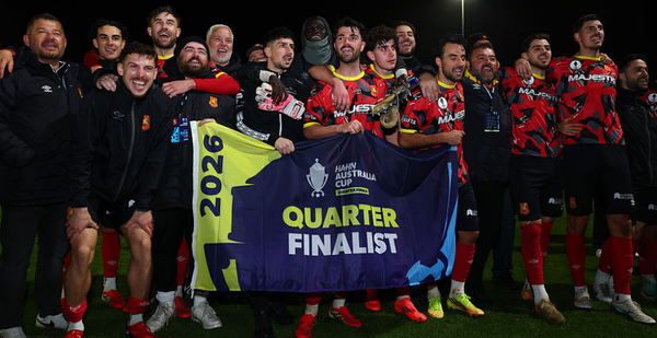 MELBOURNE, AUSTRALIA - AUGUST 12: The Lions celebrate with the Quarter Finalist flag after winning the Australia Cup round of 16 match between Brunswick Juventus FC and Preston Loins FC at CB Smith Reserve, on August 12, 2026 in Melbourne, Australia. (Photo by Daniel Pockett/Getty Images)