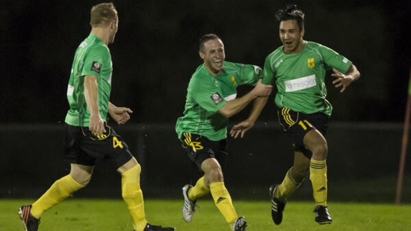 South Springvale players celebrate a goal in their 3-0 win over Hume City.