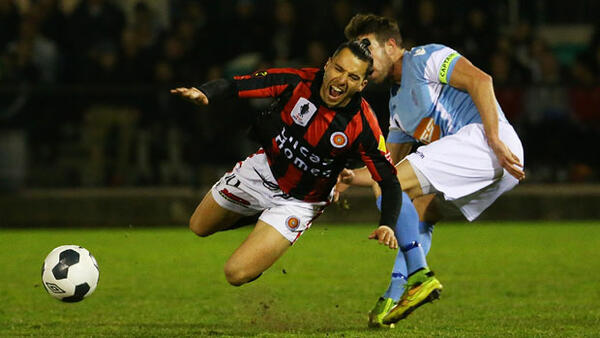 Marko Jesic cops a foul against Perth SC.