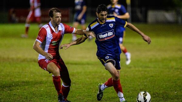 Action from the match between Kenthurst and The Entrance.
