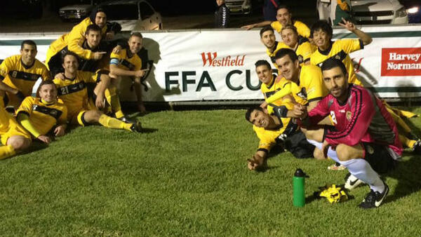 Balmain Tigers FC players celebrate their progression to the Round of 32.