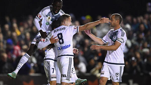 Victory players celebrate Marcos Rojas' goal in their win over Bentleigh Greens.