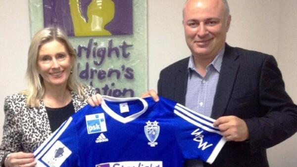 Starlight Children's Foundation CEO Louise Baxter and Sydney Olympic Head of Corporate Partnerships Paul Aspros.