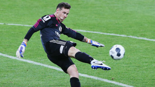 Hume City goalkeeper Chris Oldfield launches the ball down field at AAMI Park.
