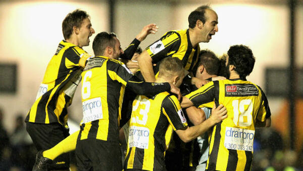 South Springvale players celebrate scoring against South Cardiff in last season's Westfield FFA Cup.