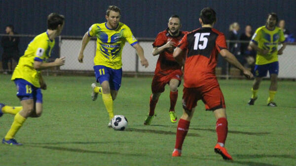Strikers’ Sam Knight on the ball against Redlands United. Credit: Ray Gardner/Redlands United FC
