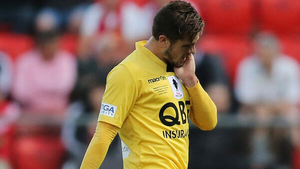 Josh Risdon leaves the field after being sent off against Adelaide United.