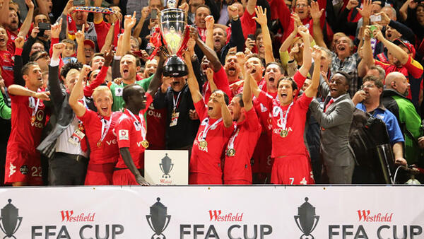 Adelaide United lift the inaugural Westfield FFA Cup crown.