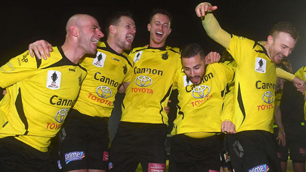 Heidelberg players celebrate following their win over Perth Glory.