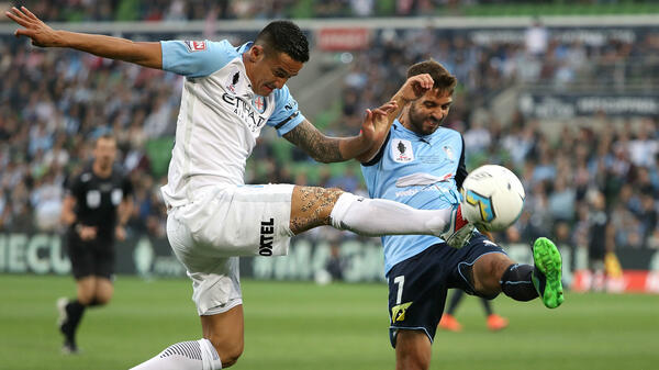 Sydney FC defender Michael Zullo and City's Tim Cahill during the 2016 Westfield FFA Cup final.