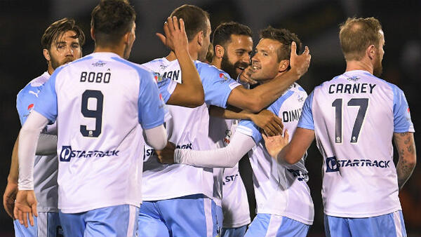 Sydney FC players celebrate their second goal against Canberra Olympic in their Westfield FFA Cup Semi Final.