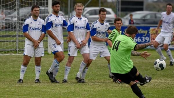 Bell Park players defend a Geelong SC free kick