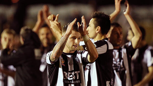 Adelaide City players celebrate after their 1-0 victory over Western Sydney Wanderers.