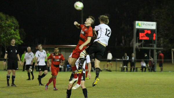 Players fly high in the middle of the park at Cleveland Showgrounds. Image credit: Ray Gardner