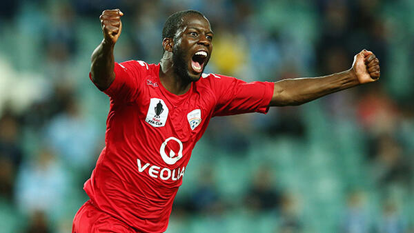 Adelaide United's Bruce Djite celebrates scoring the Reds second goal.