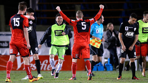 Paul O'Brien celebrates Redlands' stunning win over Adelaide at fulltime.