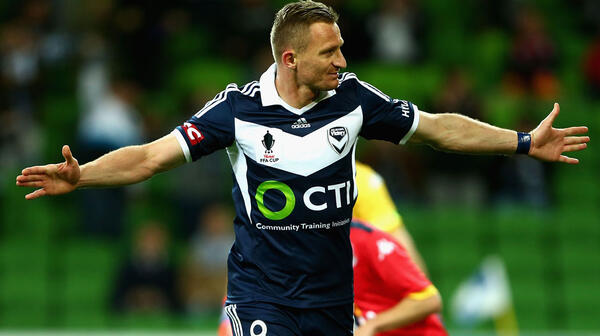 Besart Berisha celebrates after converting from the penalty spot.