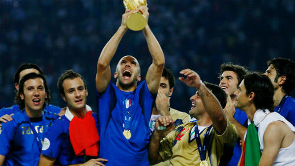 Alessandro Del Piero lifts the 2006 FIFA World Cup trophy with his Italy teammates.
