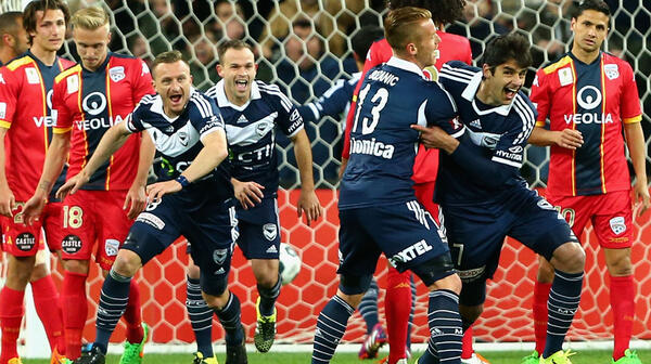 Victory players celebrate Gui Finkler's stunning opener against the Reds.