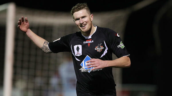 Joey Gibbs celebrates one of his two goals against APIA Leichhardt on Tuesday night.