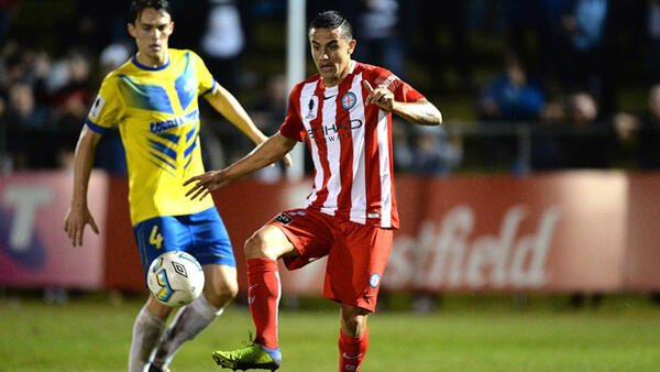 Tim Cahill's Melbourne City debut ended with a 2-1 win over Brisbane Strikers in the FFA Cup.