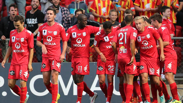 Reds players celebrate Sergio Cirio's goal against Perth Glory.