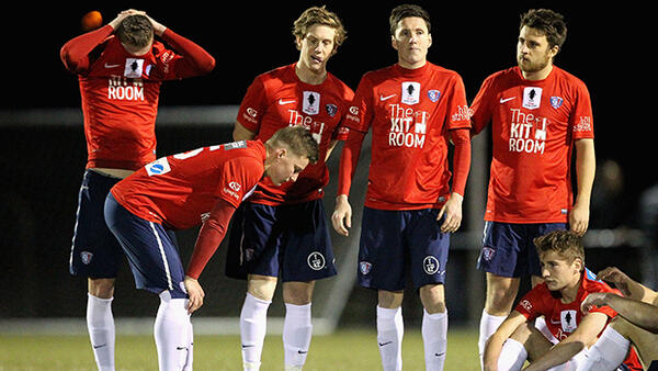 South Hobart players look on following their penalty shootout loss to Tuggeranong.