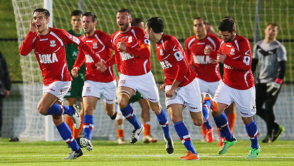 Sydney United 58 celebrate scoring the opener against FNQ Heat.