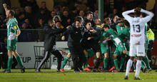Liam Boland of Green Gully and teammates celebrate a goal in the dying stages to win during the Australia Cup Round of 32 match between Green Gully and the Central Coast Mariners at Green Gully Reserve on August 2, 2016