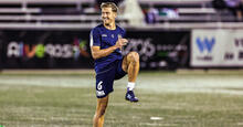 Stefan Mauk warms up for Adelaide United prior to facing Blacktown City