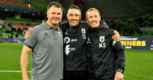 Macarthur FC Head Coach Mile Sterjovski and Macarthur FC assistant coach Christophe Gamel pose after winning the 2024 Australia Cup Final match between Melbourne Victory and Macarthur FC at AAMI Park on September 29, 2024