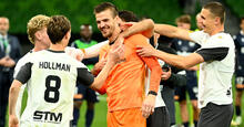 Filip Kurto of Macarthur FC is congratulated by team mates after being awarded the Mark Viduka medal following the 2024 Australia Cup Final match between Melbourne Victory and Macarthur FC at AAMI Park on September 29, 2024